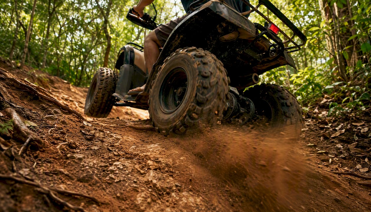 ATV climbing steep Phuket trail