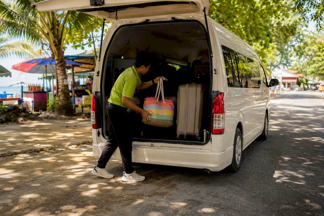 Hotel transfer van loading luggage in Phuket