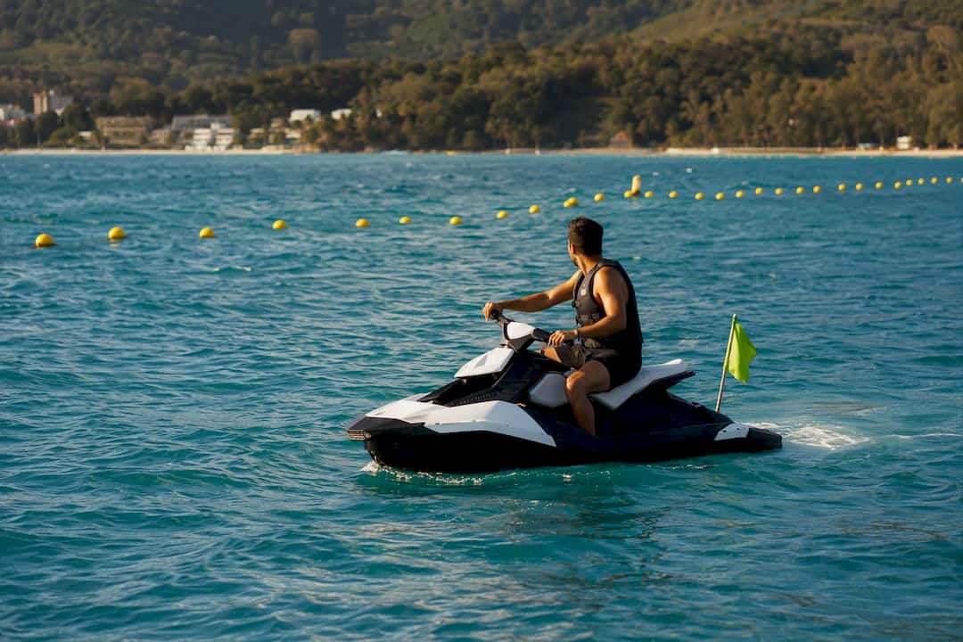 Rider slowing near marked swim zone