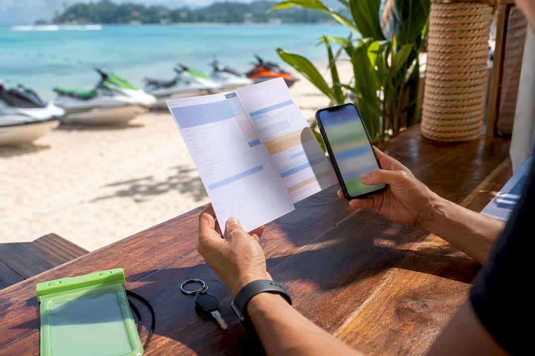 Traveler photographing jet ski documents