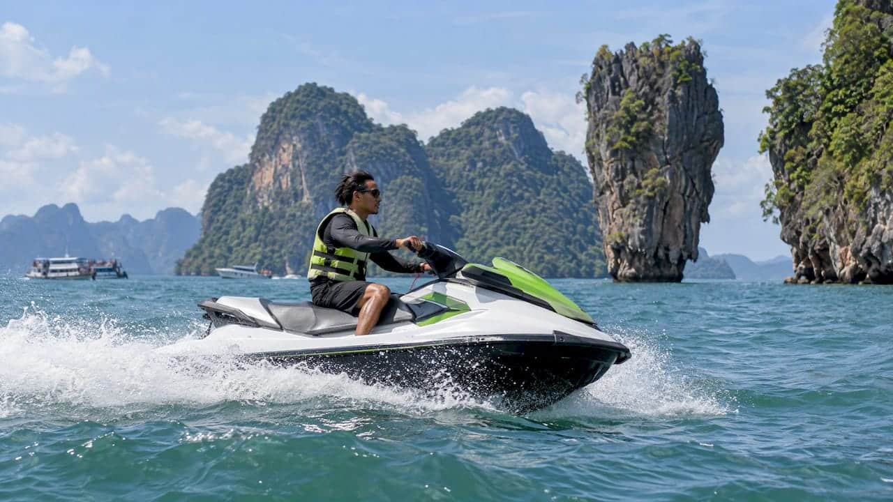Jet ski rider near Phang Nga limestone islands