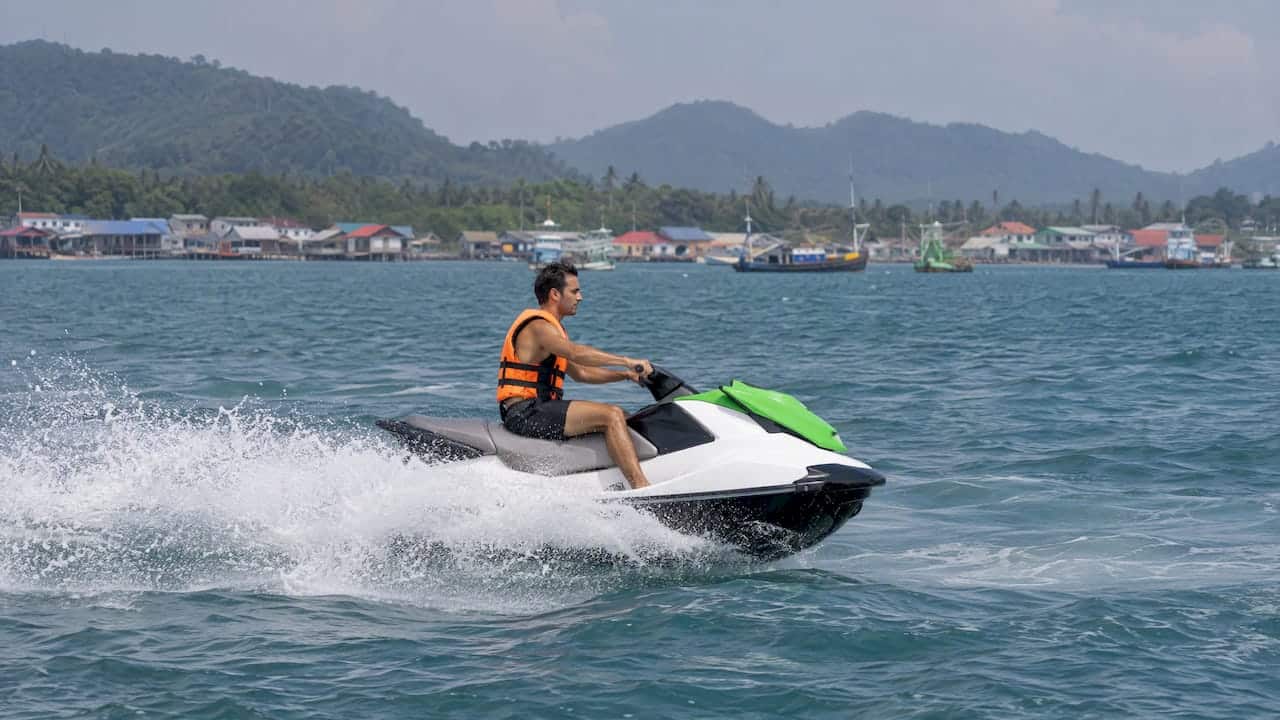 Jet ski rider cruising Phuket open waters