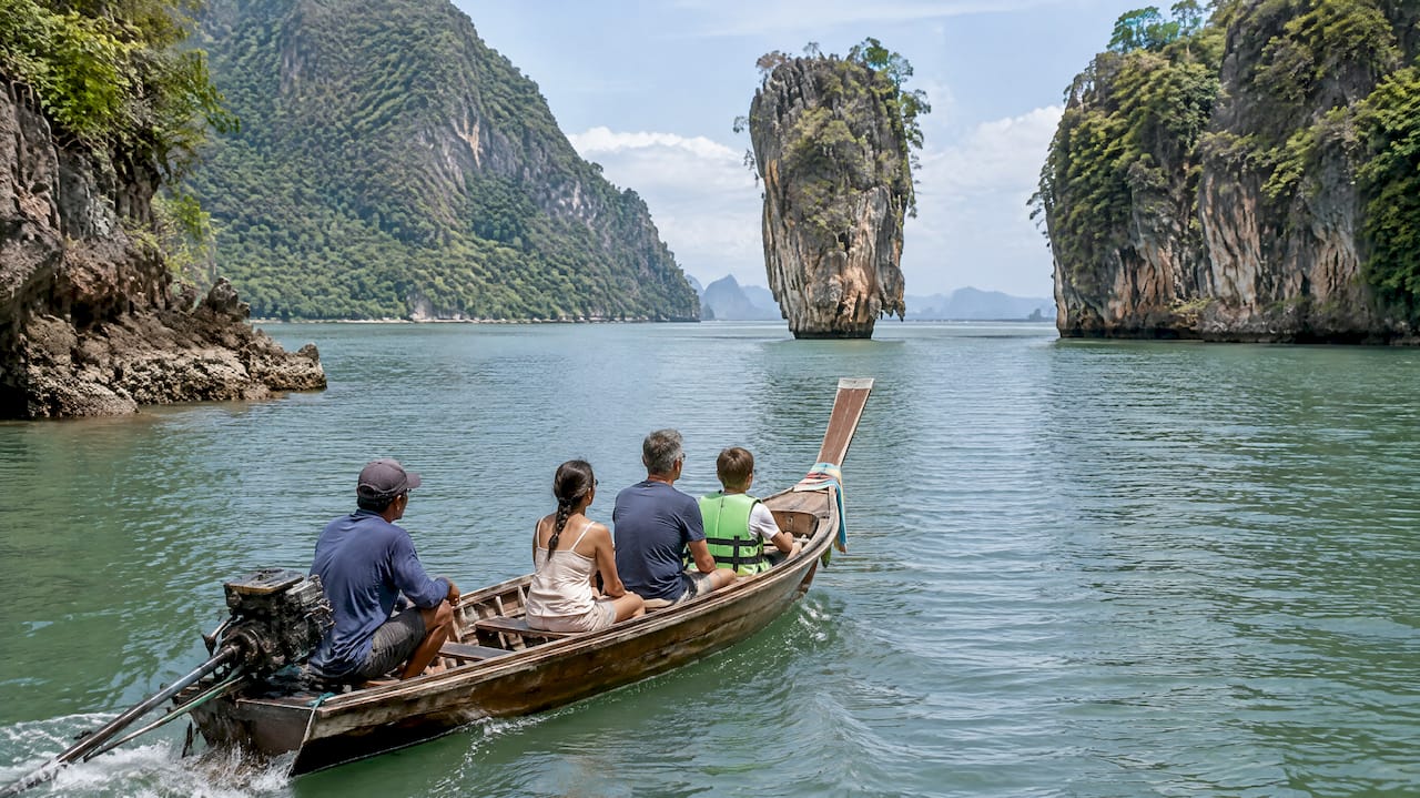 Travelers viewing Ko Tapu from a boat