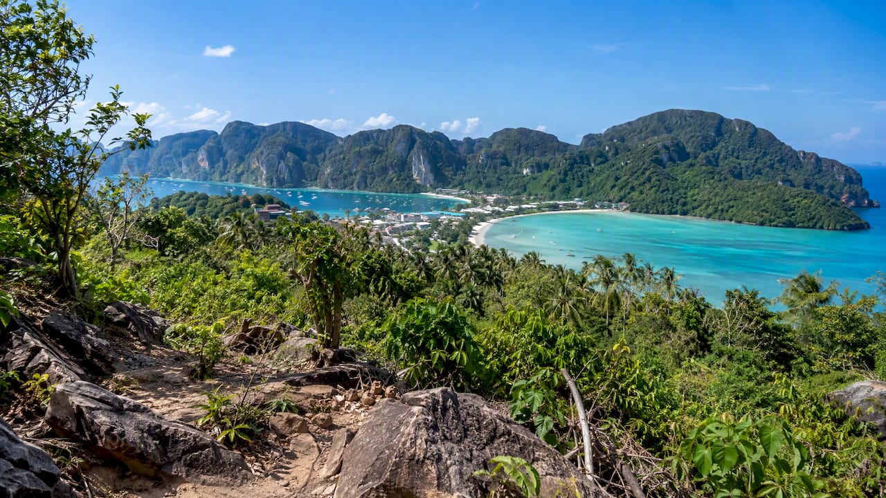 Phi Phi twin bays beneath limestone cliffs
