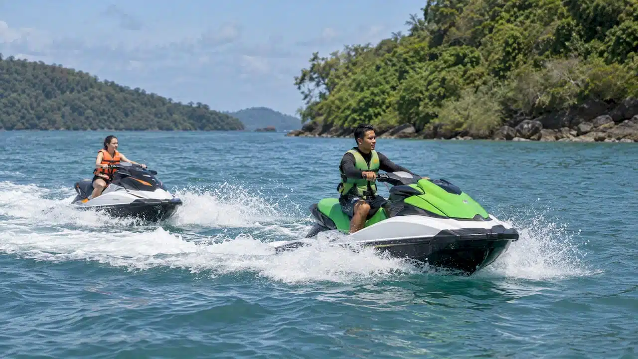Guide leading a guest on a Phuket jet ski tour
