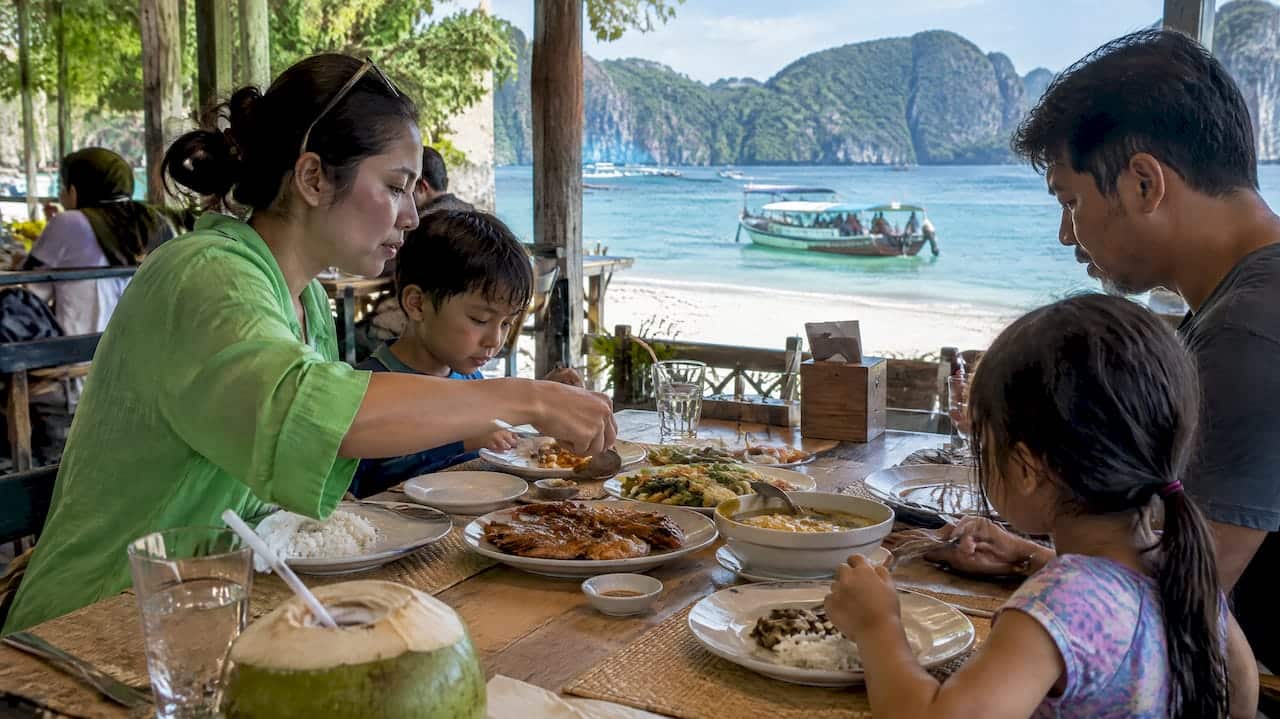 Family sharing lunch at a Phi Phi Don restaurant